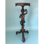 A late 19th century to early 20th century carved wood Venetian figural occasional table, with shaped