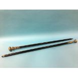 Two reproduction walking canes