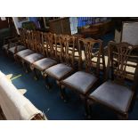 A set of eight dining chairs, comprising six single and two carvers