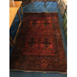 An Afghan rug, 165 x 103cm