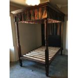 A mahogany and pine four poster bed with acanthus and four scrolling columns