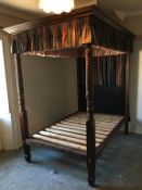 A mahogany and pine four poster bed with acanthus and four scrolling columns