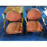 A pair of walnut Art Deco style armchairs