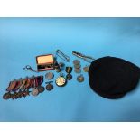 A collection of assorted medals and coins etc.; to include World War II set to 'A Johnson Stok R.N',