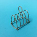 A silver toast rack, marks rubbed 1oz