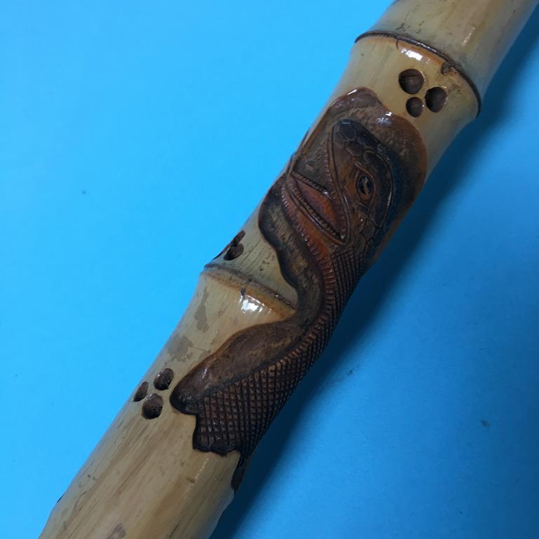 A carved bamboo walking cane - Image 3 of 4