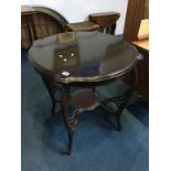 An Edwardian mahogany occasional table