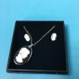 A Cameo necklace and earrings set