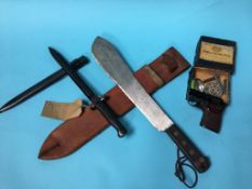 A bayonet machete and a starters pistol