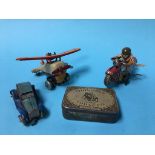 A collection of tin plate clockwork toys