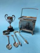 Silver tongs, a small trophy, two spoons and a silver plated lantern