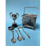 Silver tongs, a small trophy, two spoons and a silver plated lantern