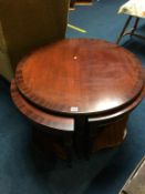 A mahogany occasional table