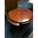 A mahogany occasional table