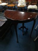 A half moon table, 75cm wide, 38cm deep and an occasional table