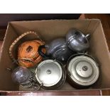 A collection of biscuit barrels and a pewter tea set