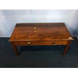 An oak two drawer side table