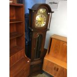 A Jaycee reproduction oak long case clock