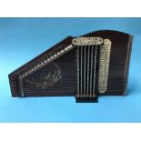 A boxed table harp