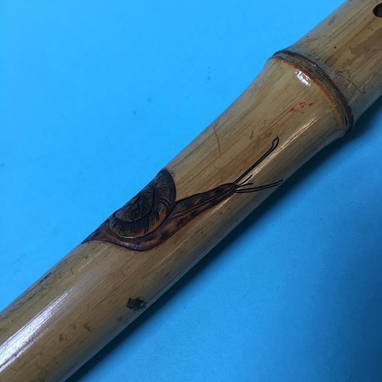 A carved bamboo walking cane - Image 2 of 4