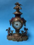 A reproduction brass mounted mantle clock