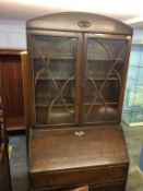 An oak bureau bookcase