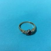 A 9ct ruby and diamond ring, 1.9g