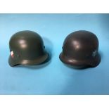 Two German style helmets