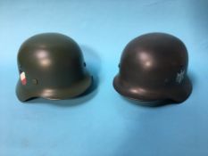 Two German style helmets