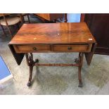 A reproduction mahogany sofa table