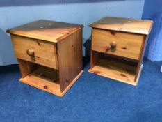 A pair of pine bedside cabinets