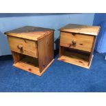 A pair of pine bedside cabinets