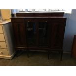 A mahogany china cabinet