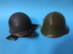 Two German type helmets