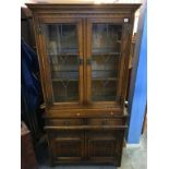 An oak Old Charm display cabinet