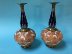 A pair of Doulton Lambeth vases (a/f)