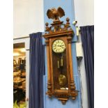 A walnut wall mounted Vienna regulator twin weight wall clock