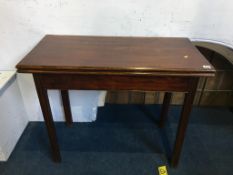 A mahogany tea table