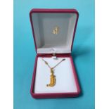 A 9ct necklace and gold coloured pendant stamped 2k, 5.5g total