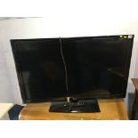 A 42" LG TV, with remote ( in office )