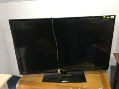 A 42" LG TV, with remote ( in office )