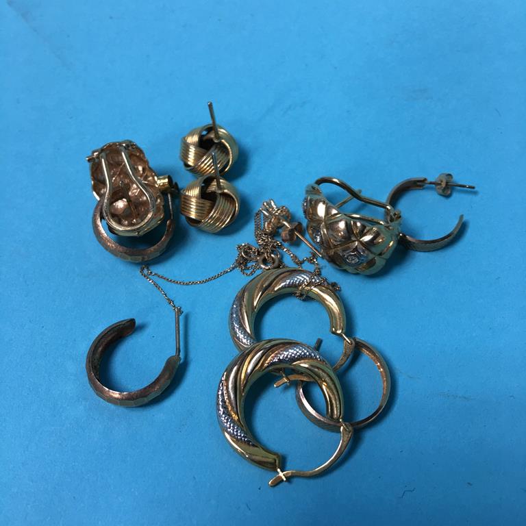 A collection of various earrings