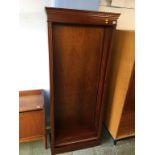 A reproduction mahogany bookcase