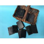 A collection of small leather bound bibles