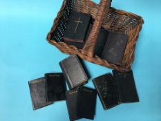 A collection of small leather bound bibles