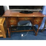 An oak priory style desk, 101cm wide, 49cm deep, 76cm high