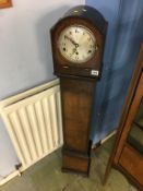 An oak cased Grand daughter clock