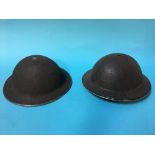 Two military helmets