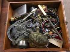 A box of assorted metalware