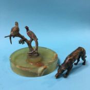 A bronze dog and cold painted bronze pheasant